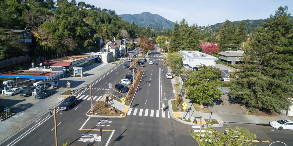 Image of redesigned Miller Ave in Mill Valley, showing 2 separated lanes of traffic.