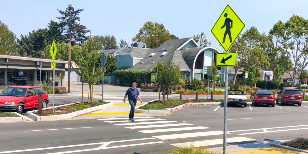 Image of pedestrian crossing Miller Ave in Mill Valley, CA.